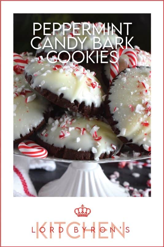 Peppermint Candy Bark Cookies are prepared with a deep, rich, chocolate cookie base made extra chocolatey with good cocoa.  Infused with lots of candy cane flavour, they look extra festive with a quick dip in melted bark and a sprinkling of crushed candy canes. #chocolate #candycanes #peppermint #almondbark #cocoa