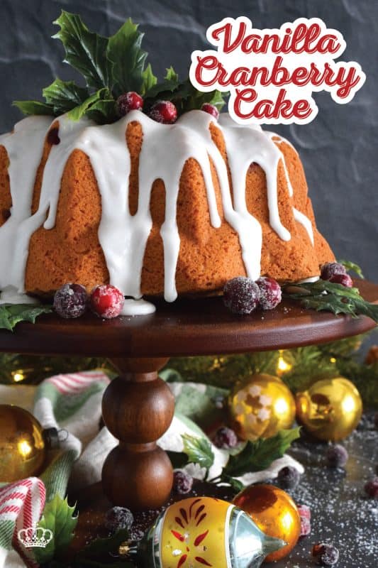 A simple and rustic cake that starts with butter, sugar, and eggs.  This Vanilla Cranberry Cake is heavily flavoured with vanilla extract, and tart, fresh cranberries.  Prepared with evaporated milk, this cake is pillowy soft and moist! #fresh #cranberry #cranberries #cake #bundt